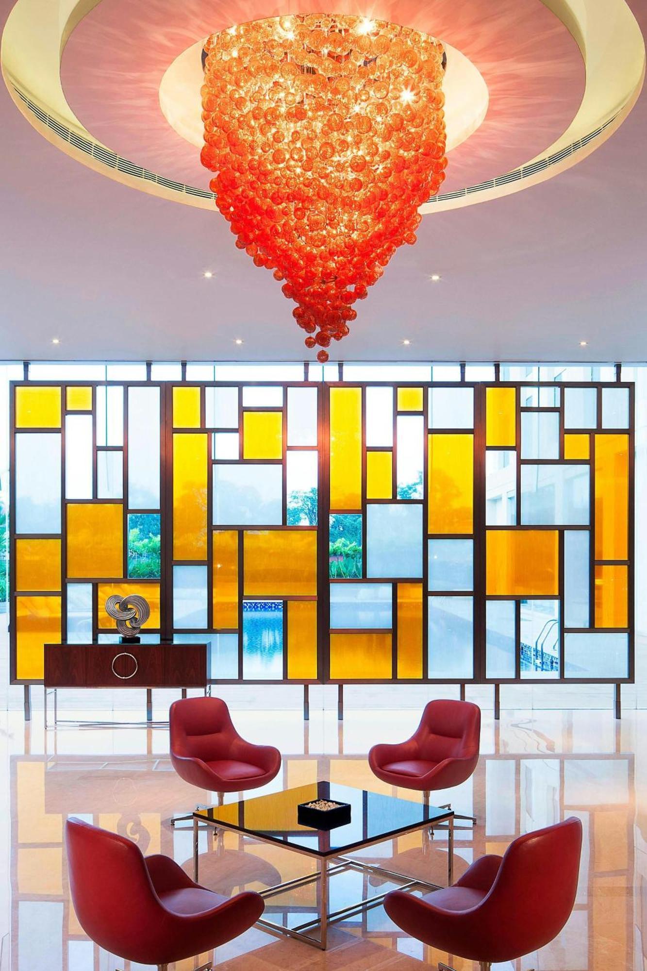 Courtyard By Marriott Kochi Airport Hotell Nedumbassery Eksteriør bilde A room divider